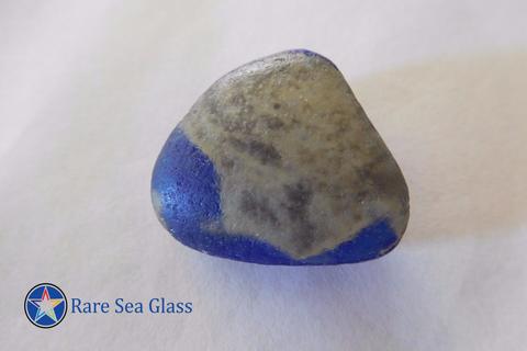 Another Davenport world globe sea glass fragment with brown and blue coloring