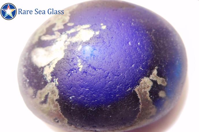 World globe sea glass piece from Davenport Beach